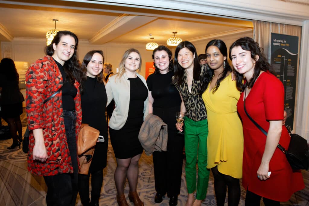 Photo of a group of attendees posing together from the 2025 Evening for Equality event.