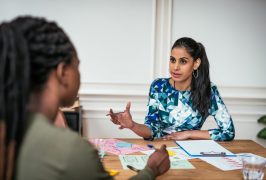 Multi ethnic group of Millennial investors planning new gainful activity